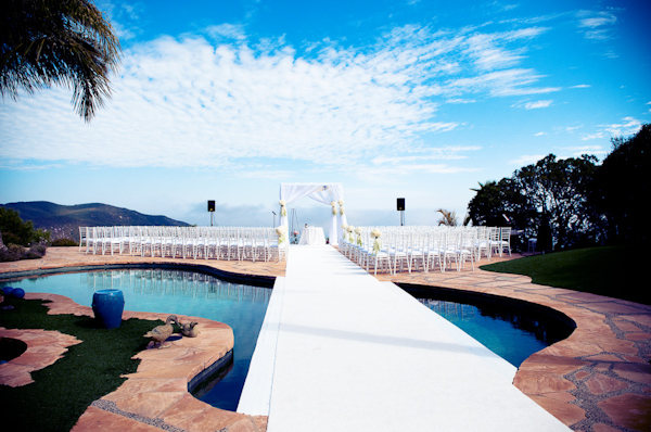 view of cermonial seating in the aisle from the rear - photo by Southern California wedding photographers Callaway Gable